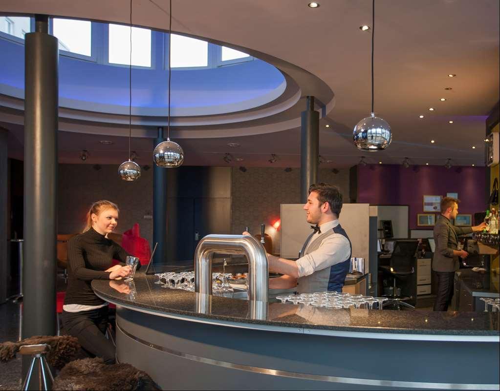 Designhotel + Congresscentrum Wienecke Xi. Hannover Restaurang bild
